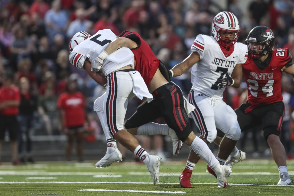 Hannibal’s Tyler Hardy sacks Jefferson City quarterback Hayden Wells during Friday's game at Porter Stadium in Hannibal, Mo. (Photo courtesy Mathew Kirby)