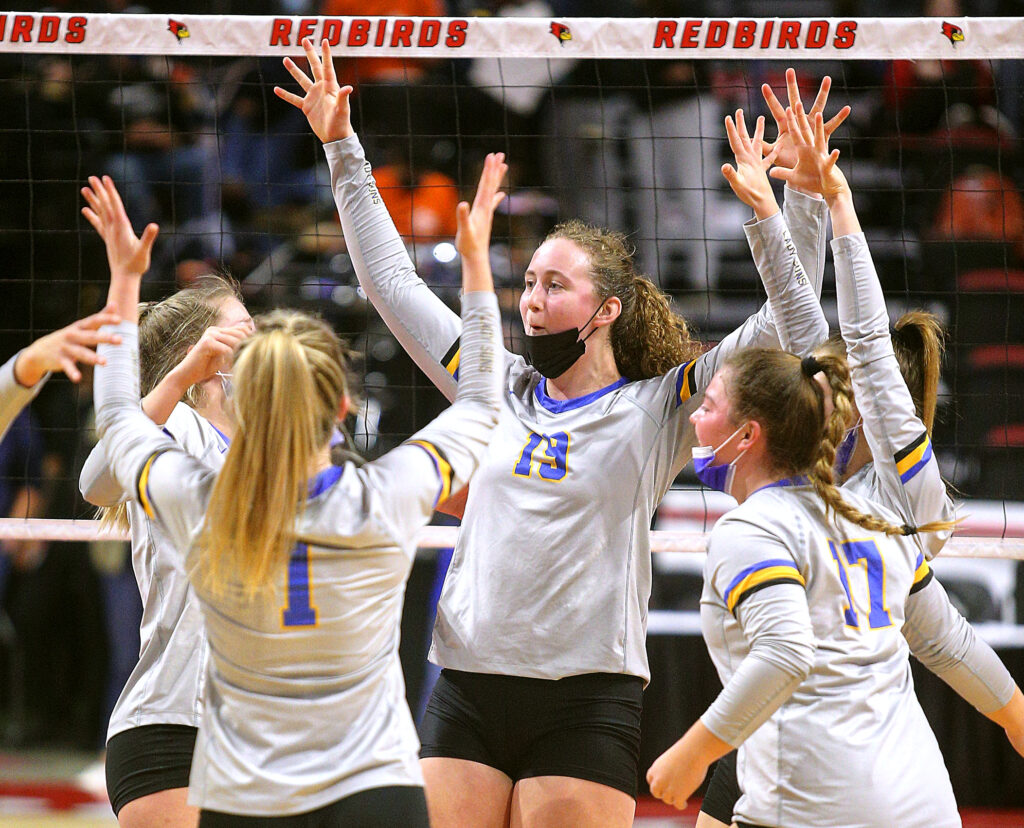 November 12, 2021 - Normal, Illinois - Southeastern's Amanda Stephens and teammates celebrate a point for their team during set two at the Illinois High School Association Volleyball State Finals. The Lady Suns advanced to the Class 1A state title match tomorrow after defeating Crusaders in straight sets, 25-16, 25-23.  (Photo: PhotoNews Media/Clark Brooks)