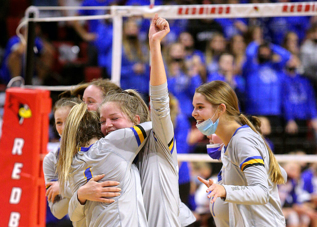 November 12, 2021 - Normal, Illinois - Southeastern's Summer Ramsey and Taylor Wagner celebrate their second set victory over Springfield Lutheran at the Illinois High School Association Volleyball State Finals. The Lady Suns advanced to the Class 1A state title match tomorrow after defeating Crusaders in straight sets, 25-16, 25-23.  (Photo: PhotoNews Media/Clark Brooks)
