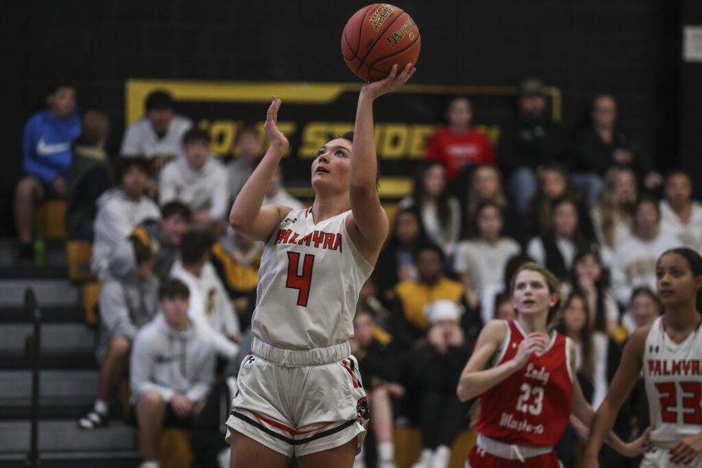 Palmyra’s Sydney Compton (4) shoots the ball off a fast break during the Panthers game against Marion County in the opening round of the 98th Annual Monroe City basketball tournament.  Mathew Kirby/herald Whig-Courier Post