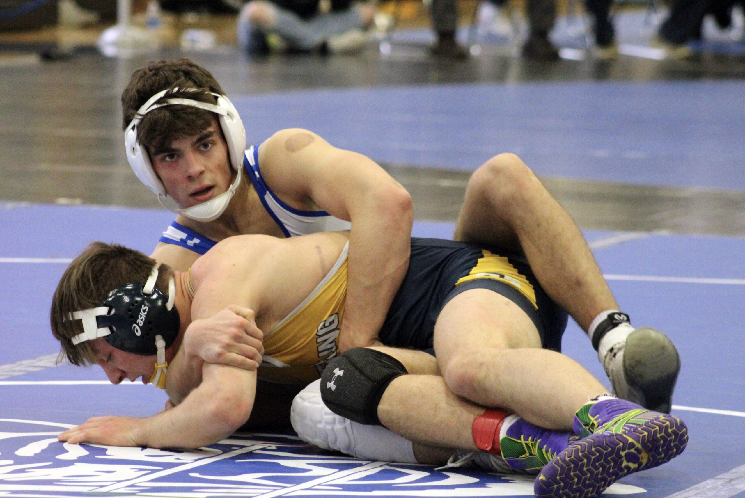 Three of a kind: QHS wrestling team finishes second in WB6 behind three ...