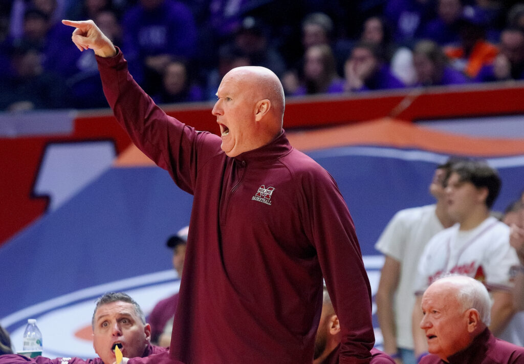 March 10, 2023 - Champaign, Illinois - Moline head coach Sean Taylor shouts instruction to his players during the second half. Taylor and the Maroon basketball team advanced to Saturday's Class 4A championship game after beating Downers Grove North 50-36 on Friday. (Photo: PhotoNews Media/Clark Brooks)