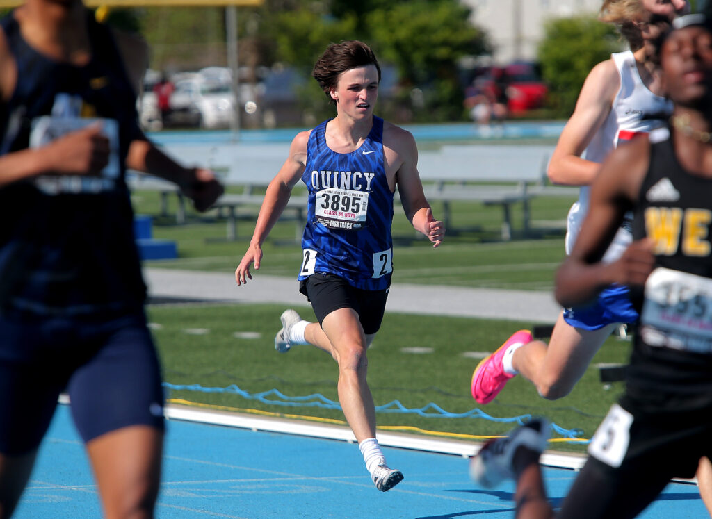 May 26, 2023 - Charleston, Illinois - Quincy's Boen Brockmiller crosses the finish line in the Class 2A 200-Meter Dash in Friday's Illinois High School Association Boys Track &amp; Field State Finals.   (Photo: PhotoNews Media/Clark Brooks)