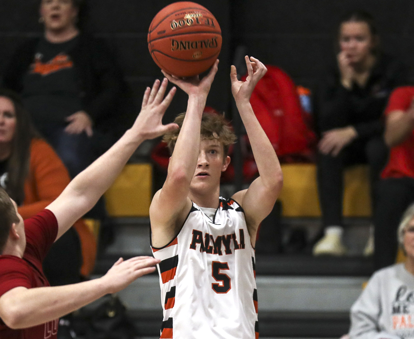 Palmyra’s Tyler Banta (5) shoots a jump shot during the Panther’s semifinal game against Louisiana in the of the 98th Annual Monroe City basketball tournament.  Mathew Kirby/herald Whig-Courier Post