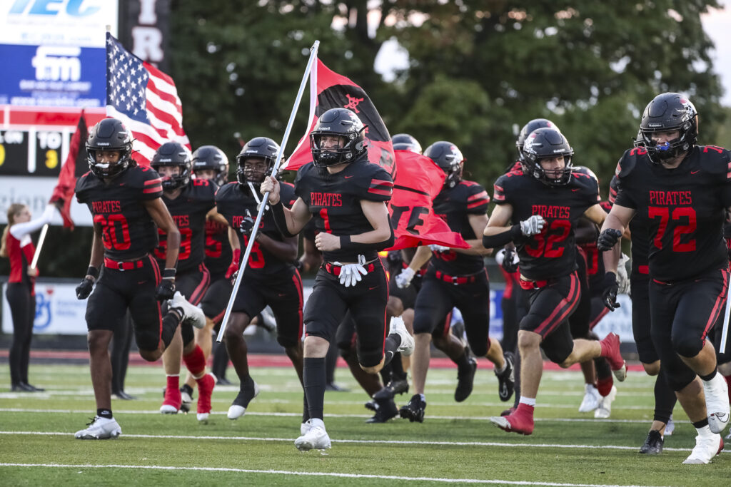 The Hannibal Pirates take the field for their game against the Fulton Hornets, Friday in Hannibal.  Mathew Kirby 