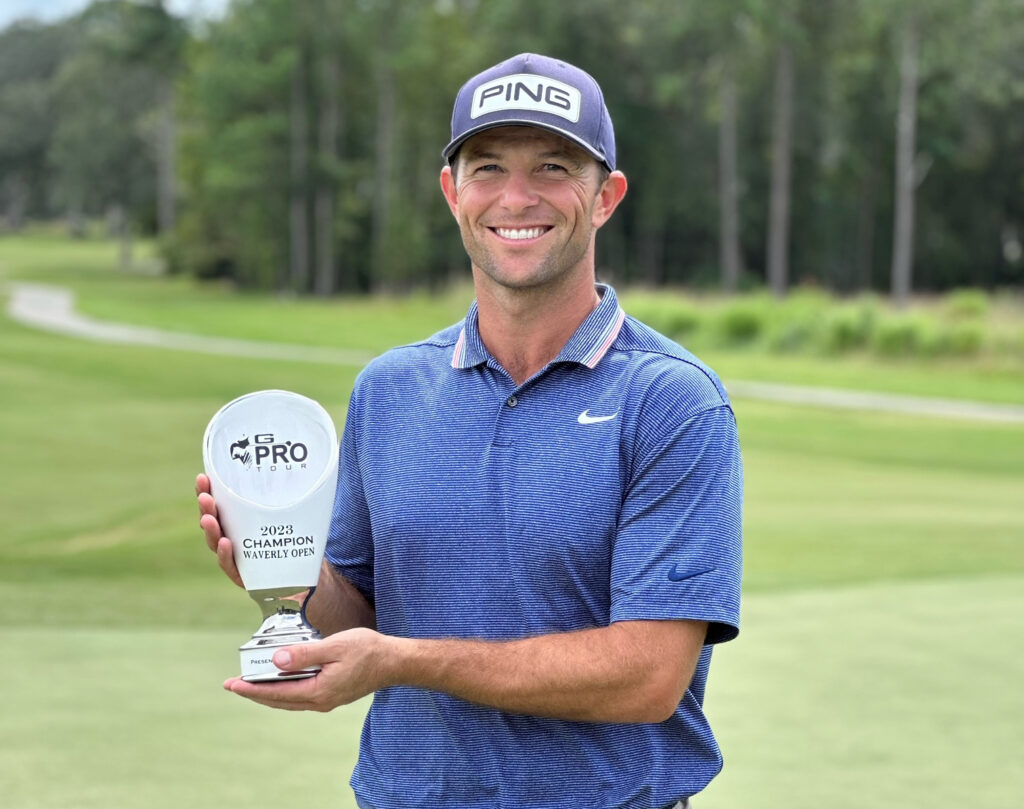 Luke with trophy