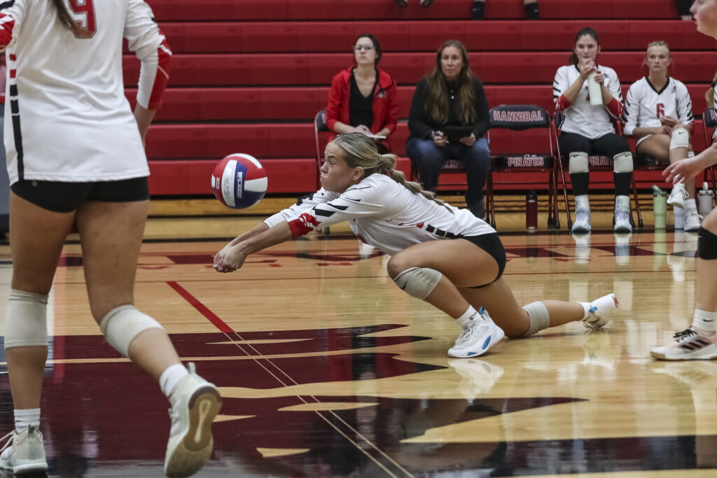 Hannibal’s Malia Stout (3) digs the ball during the Hannibal Pirates district tournament match against the Ft Zumwalt South bulldogs, Wednesday in Hannibal.  Mathew Kirby (Herald WhigCourier Post)
