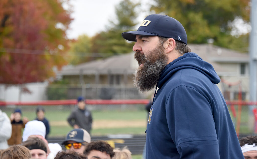 Quincy Notre Dame coach Jack Cornell addresses his team after its 21-14 victory over Arthur-Lovington-Atwood-Hammond in Saturday's Class 2A first-round playoff game in Arthur, Ill. | Photo courtesy Steve Hoffman