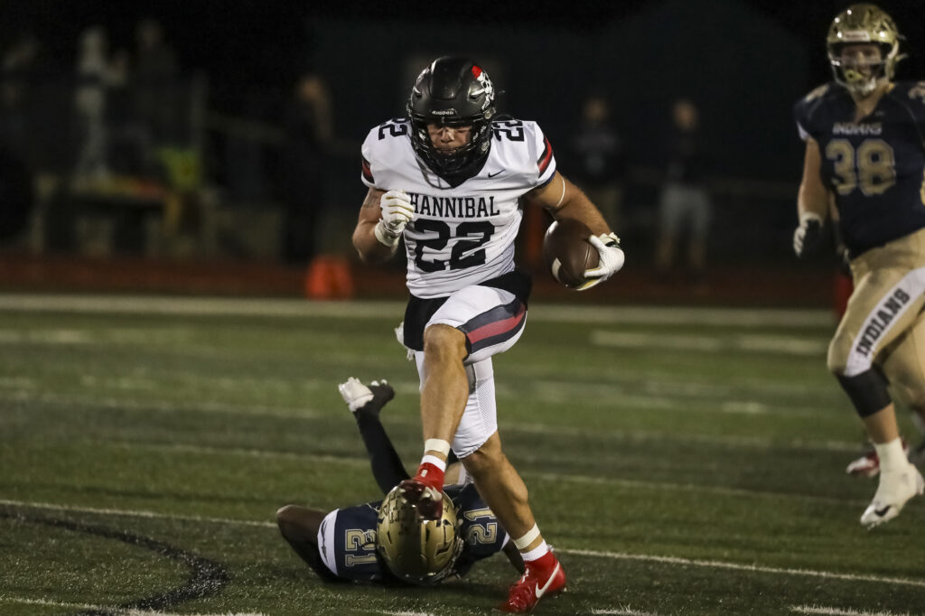 Hannibals Aneyas Williams (22) runs the ball during the Hannibal Pirates district semifinal game against the Wentzville Holt Indians in Wentzville Friday.  Mathew Kirby.