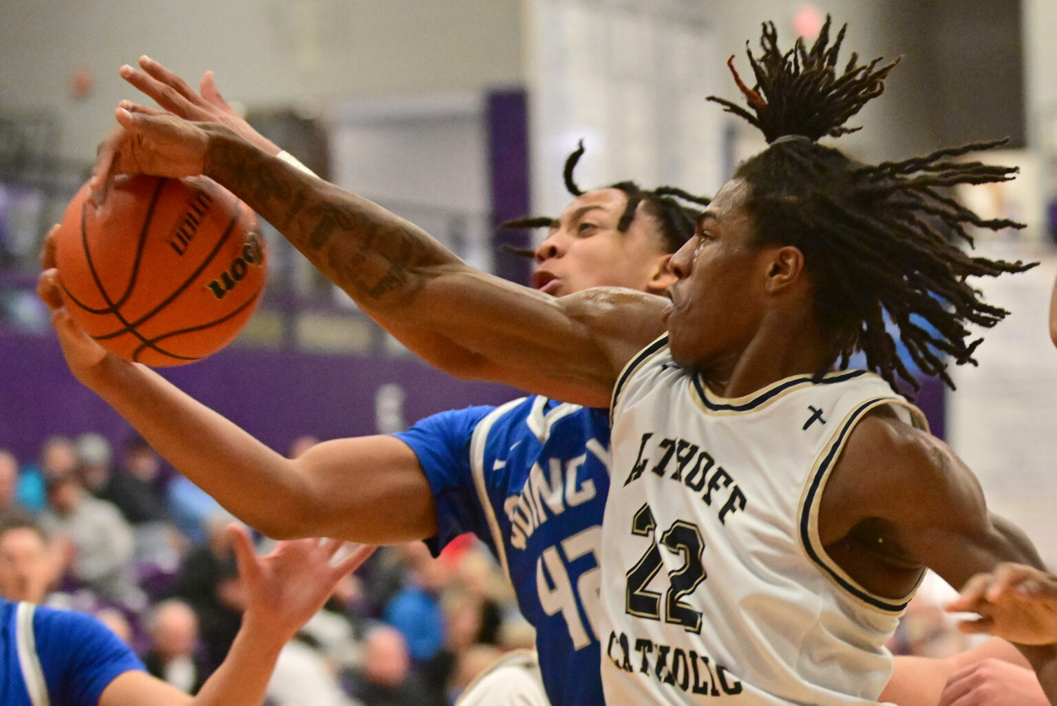Photo gallery: QHS boys move into tourney semifinals by shutting down