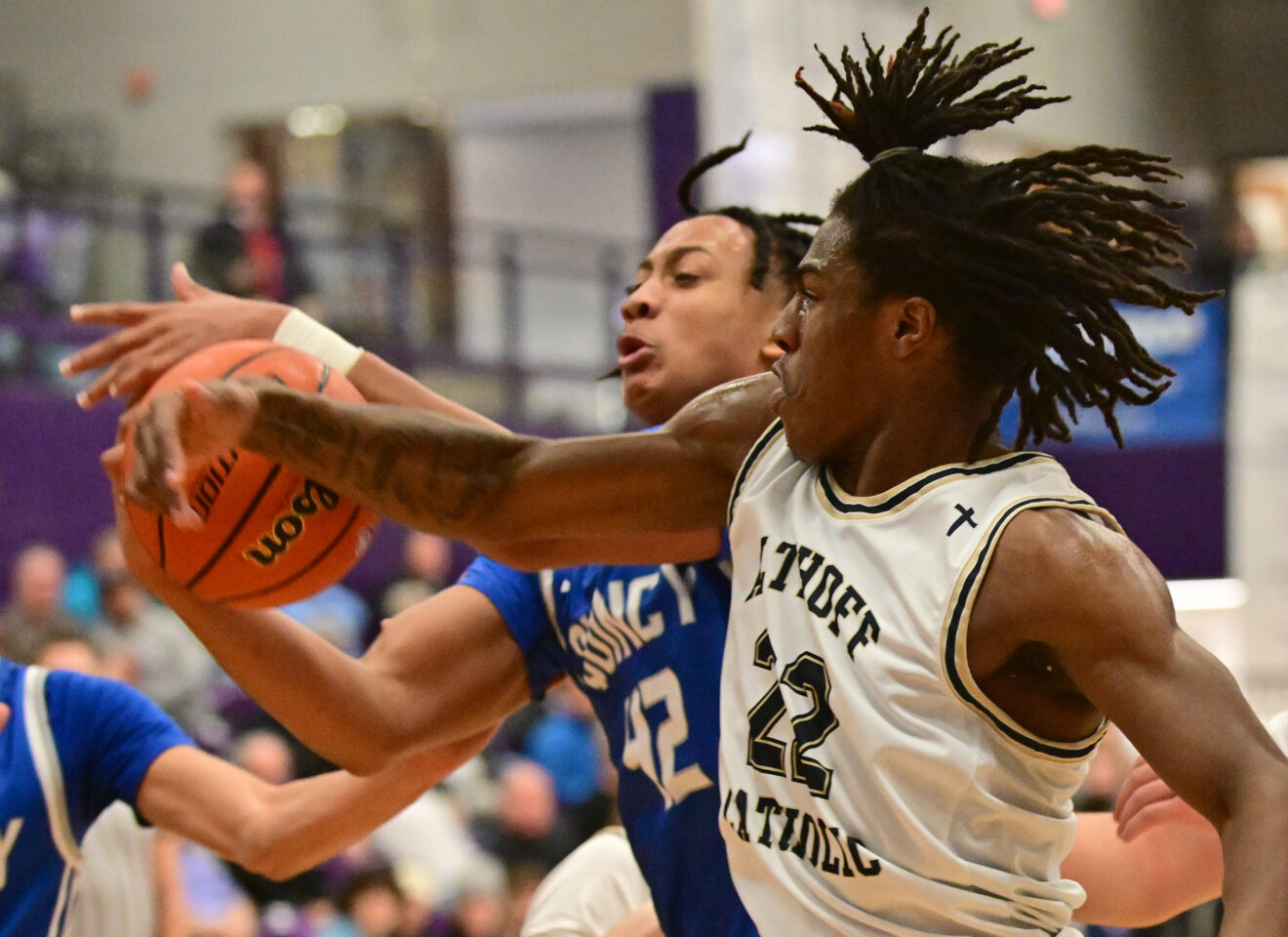 Photo gallery: QHS boys move into tourney semifinals by shutting down