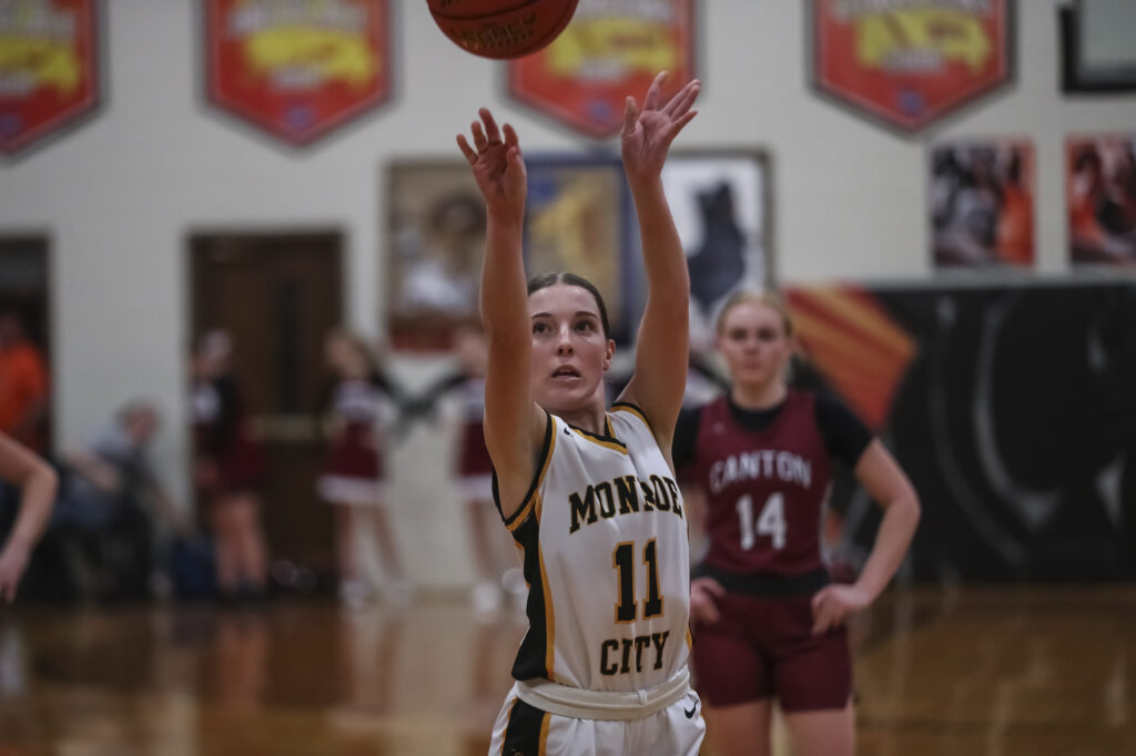 Monroe City’s Meredith Gates (11) shoots a free-throw during the Tony Lenzini basketball tournament championship game the Canton Tigers and the Palmyra Panthers, Saturday in Palmyra.  Mathew Kirby (Herald WhigCourier Post)