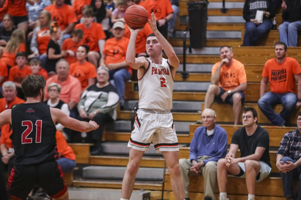 Palmyra’;s Bear Bock (2) shoots a three point shot during the Panthers sectional game against the Priory Ravens, Tuesday in Palmyra.  Mathew Kirby (Herald WhigCourier Post)