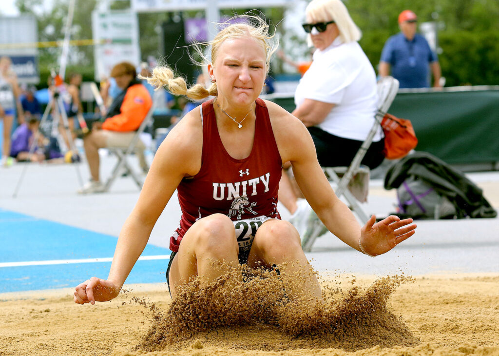 May 24, 2025 - Charleston, Illinois -  Unity's Saylor Barry lands in the sandpit on her second attempt while competing in the Class 1A Long Jump at the IHSA Girls Track &amp; Field State Finals on Saturday at O'Brien Field.  (Photo: PhotoNews Media/Clark Brooks)