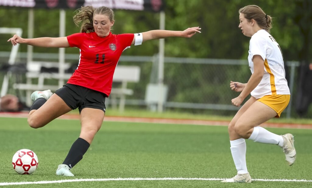 Hannibal’s Abbie Martin (11) shoot the ball during the Pirates game against the Fulton Hornets, Monday in Hannibal.  Mathew Kirby (Herald WhigCourier Post)